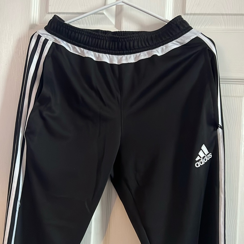 Small adidas track pants.